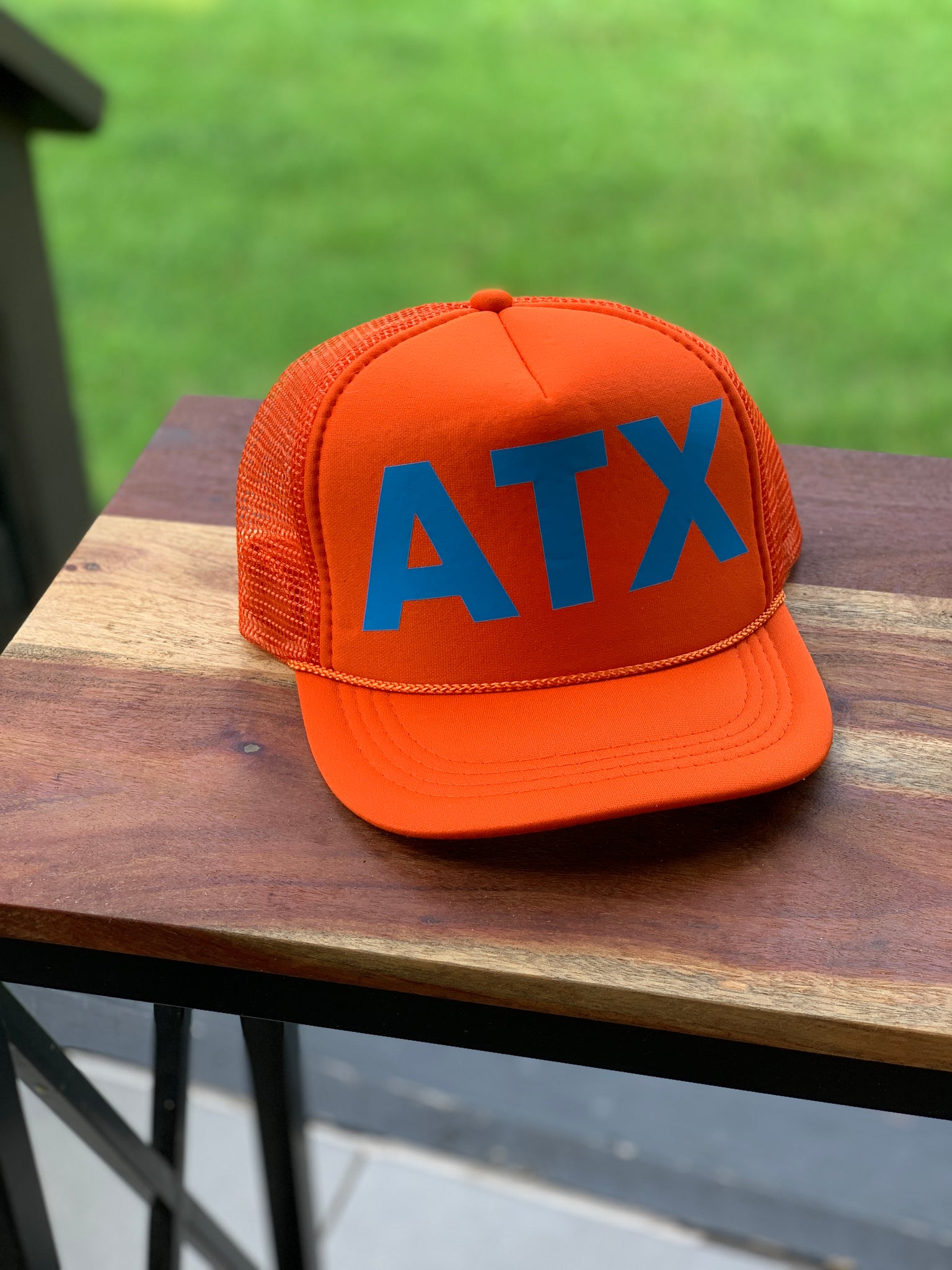 Orange and blue ATX Trucker Hat